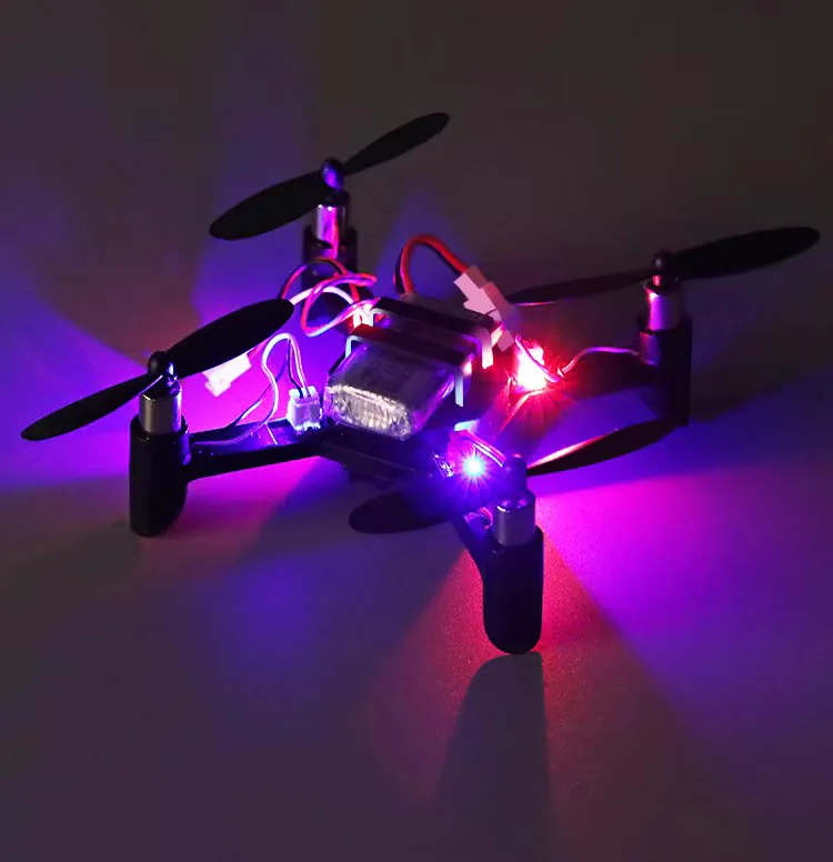 Mini STEM quadcopter with colorful LED lights illuminated