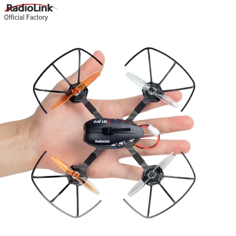RadioLink F121 micro racing drone held in one hand